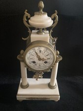 Pendule portique style Louis