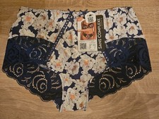 Shorty femme taille 46-48 neuf