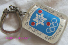 SK1554 - PORTE-CLES JEUX OLYMPIQUES D'HIVER GRENOBLE 1968 VITESSE