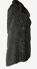 Description Noir astrakhan