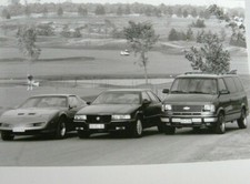 Photo presse Pontiac Firebird / Cadillac Seville STS / Chevrolet Astro Van