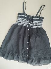 pom ponette à pois noir fille