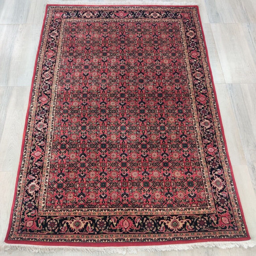 Tapis oriental vintage noué