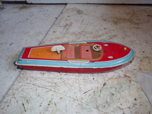 Bateau mecanique tole jouet
