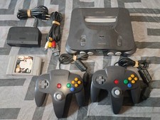 Console Nintendo 64 avec 2 manettes noires Officielles et un jeu : Goldeneye