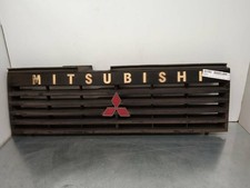grille gauche capot MITSUBISHI