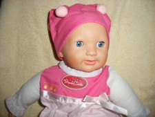 poupon de 49 cm ( marque theo