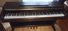 Piano numeriqueYamaha CLP-130 clavinova avec manuel d'util. Très bon etat
