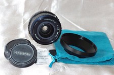 Objectif Pentax K A 28mm f2,8 TAKUMAR avec bouchons, pare-soleil et housse, TBE