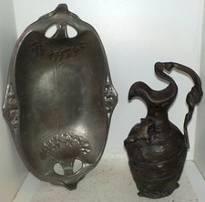 1 Pichet pur étain signé