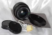 Objectif Canon FD MACRO 28mm f2,8 SICOR avec bouchon, pare-soleil et housse TBE