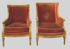 paire de fauteuils à oreilles style Louis XVI finement sculptée doré .XX siècle.