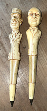 2 stylos anciens caricature