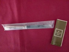 1 couteau à entrement en métal argenté Christofle modèle Spatours Sous Blister 