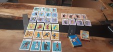 2 JEUx des 7 FAMILLES  tintin