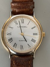Montre Lancel quartz bi ton année peu courante