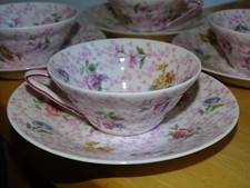 LIMOGES 4 TASSES A CAFE EN PORCELAINE DECOR FLORALE EPOQUE 1920