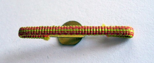 Rappel boutonnière pour - de,