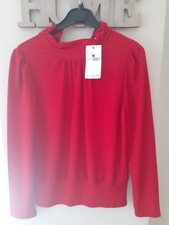 pull rouge taille L