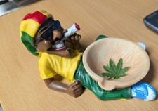 Rasta Jamaican Man Holding