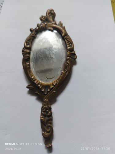 Miroir face main - main, bronze