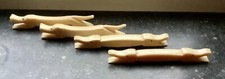 4 porte couteaux : chien et crocodile en Bakélite 