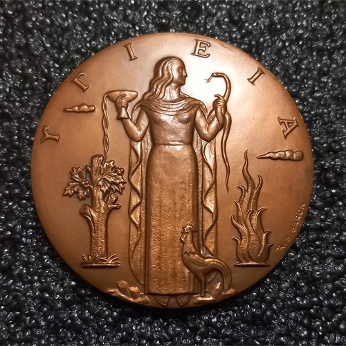 Médaille bronze femme - ×,