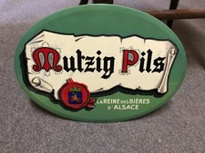 Plaque publicitaire ancienne