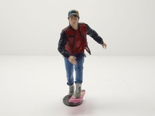 Figurine Marty Avec Hoverboard Retour vers Le Avenir pour 1:18 Modèles Cartrix