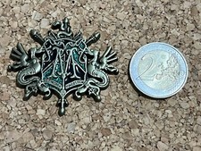 Pin's en relief ciselé