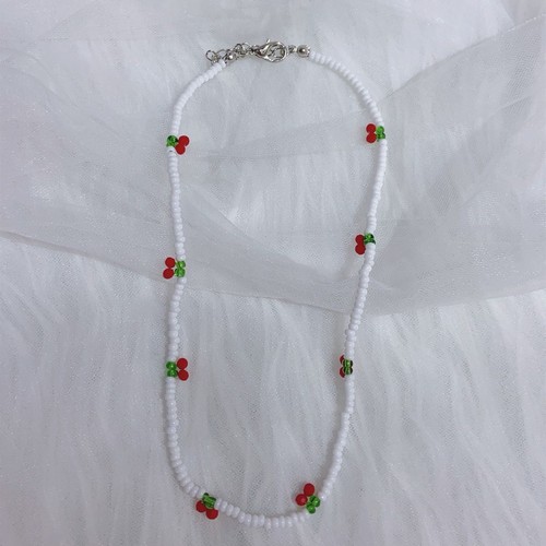 Collier perles - en,