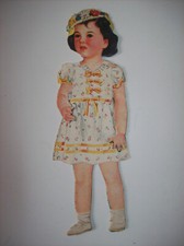 Ancienne poupée en carton -