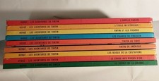 Neuf albums TINTIN
