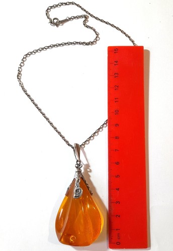 Pendentif ambre chaîne - et,
