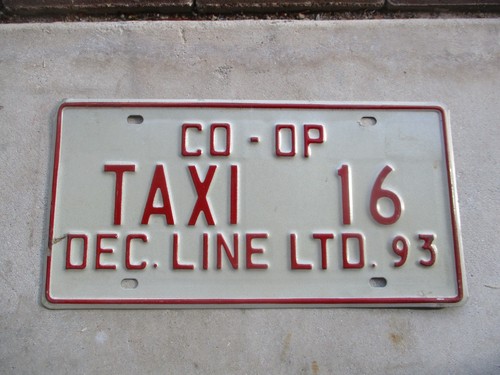 Taxi license plate - -,