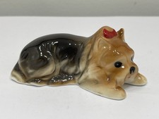 Figurine en porcelaine chien