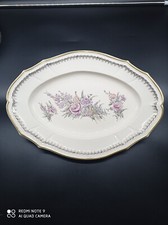 Ancien grand plat  en faïence de Rovina Epinal , décors  floraux .