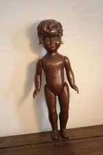 Ancienne poupée de foire peau noire boucles d’oreilles plastique années 60