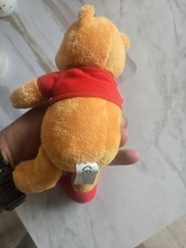 peluche disney Winnie l'ourson ours jaune pull rouge winny the pooh Doudou