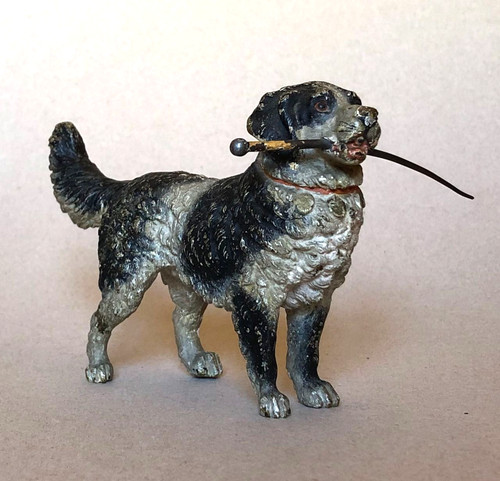 Chien portant une canne - , —