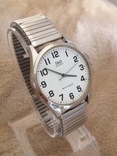 Montre Unisexe Mixte Big Size Q&Q Métal Bracelet Elastique Quartz Water Résist