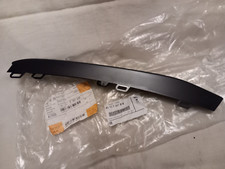 graniture finition pare choc avant droit BMW 51117397616 pièce neuve d'origine.