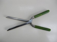 Fer à friser ancien, manches en bakélite