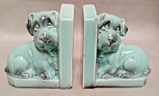 Jolie paire de serre-livres en