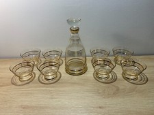Magnifique service de 8 coupes a champagne basse et une carafe en verre 