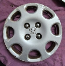Un Enjoliveur Peugeot 14