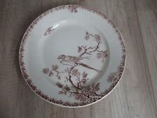 Plat rond ancien en faïence