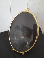 2 cadres ovales dorés sur