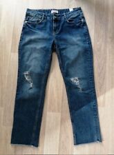 Jean bleu à trous court coton