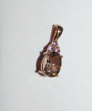 Pendentif en or rose 9 K 375 pierre taillée rose